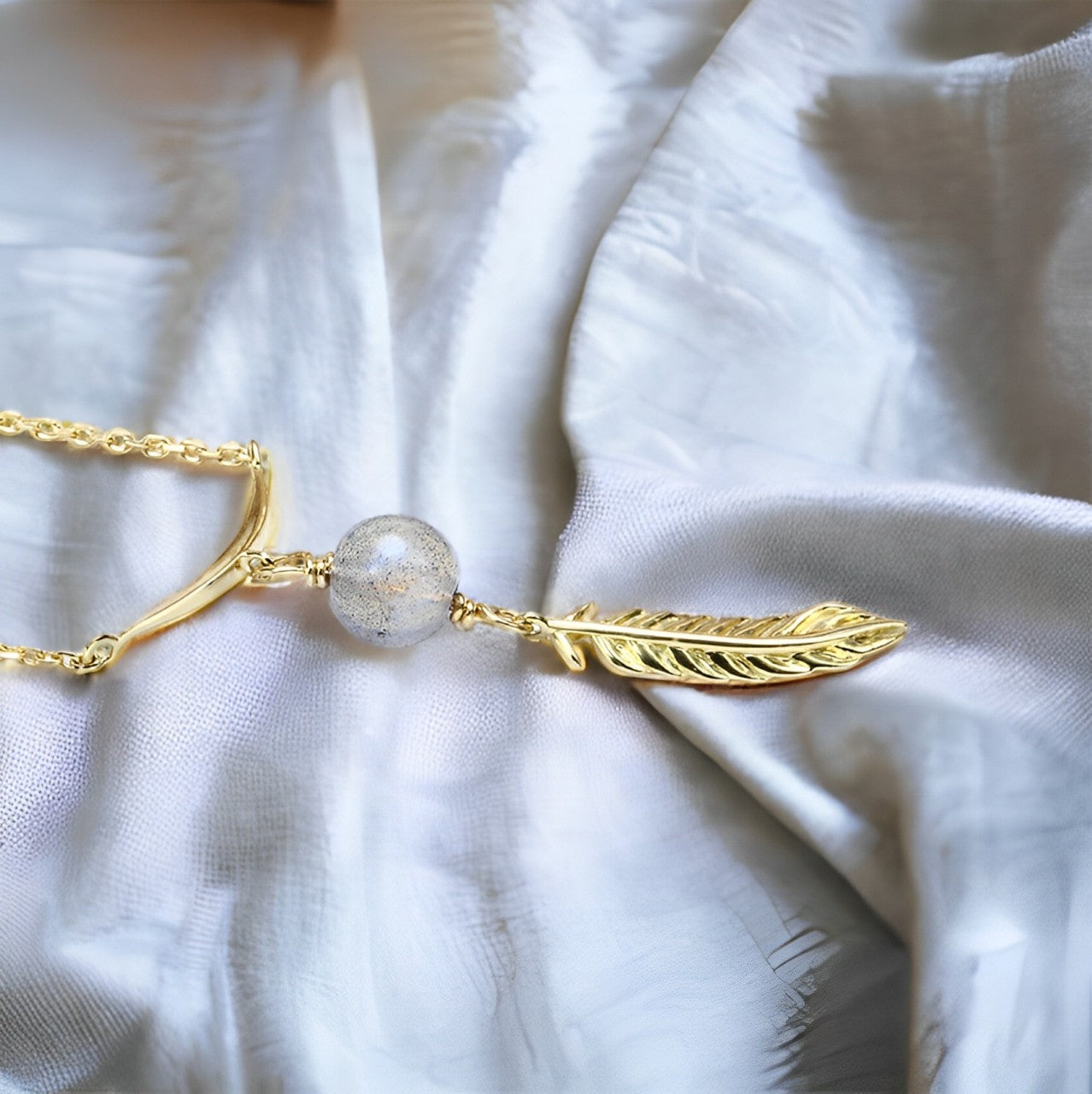 9k gold smart elongated stone feather falling necklace