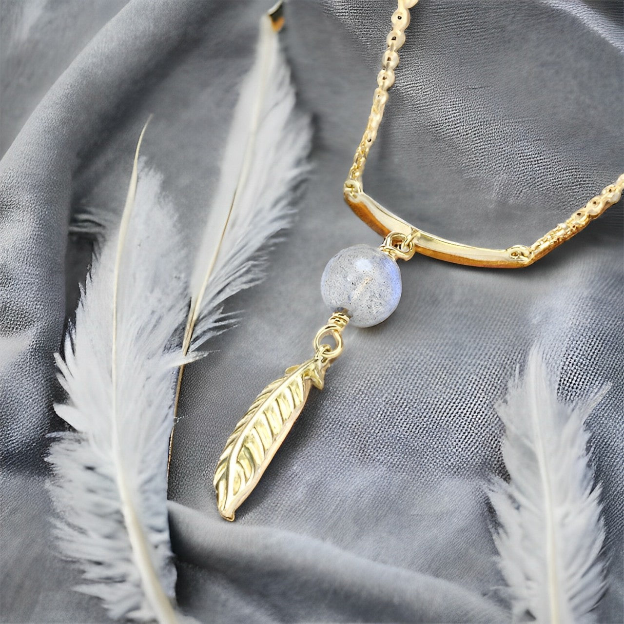 9k gold smart elongated stone feather falling necklace