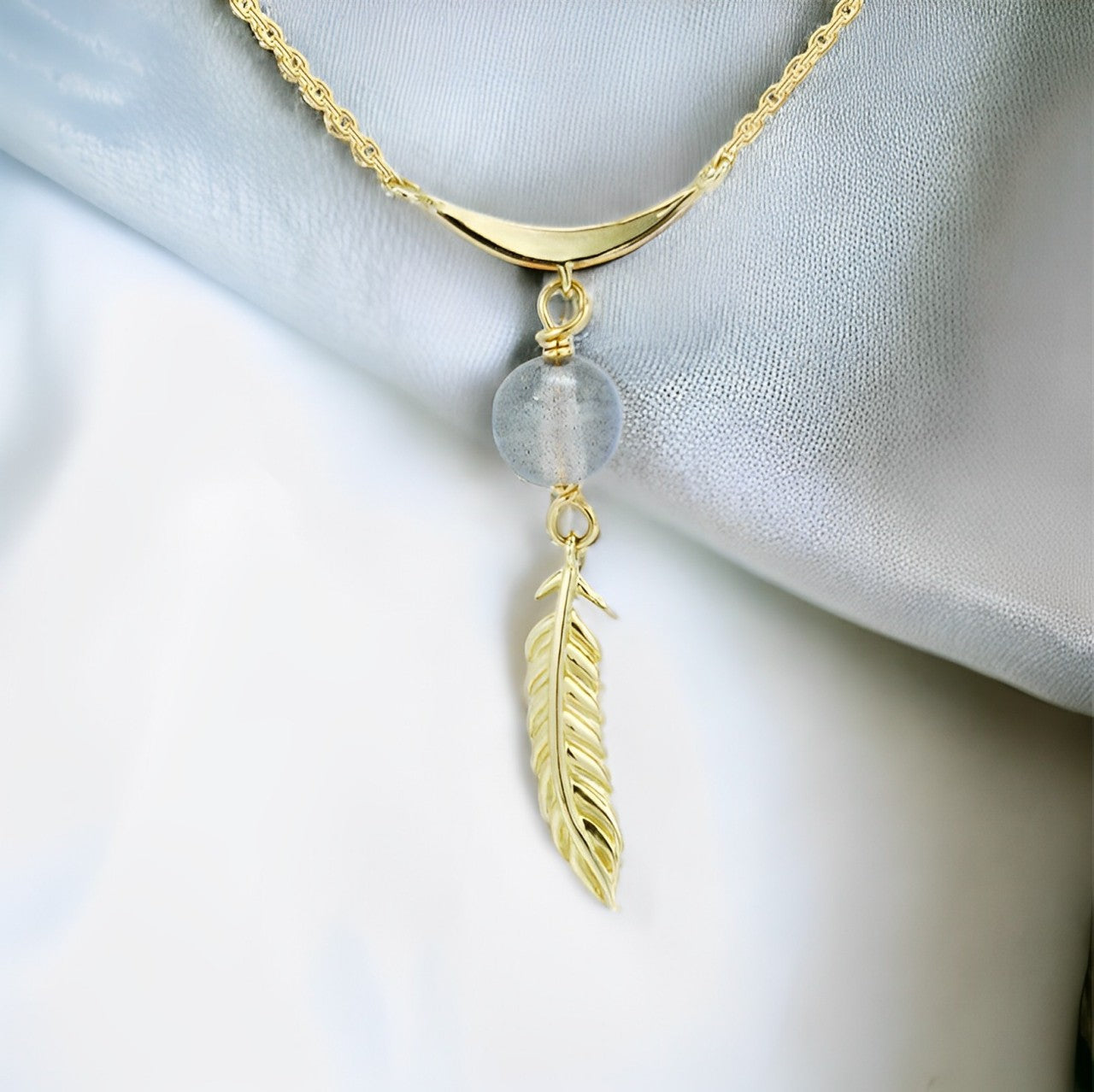 9k gold smart elongated stone feather falling necklace