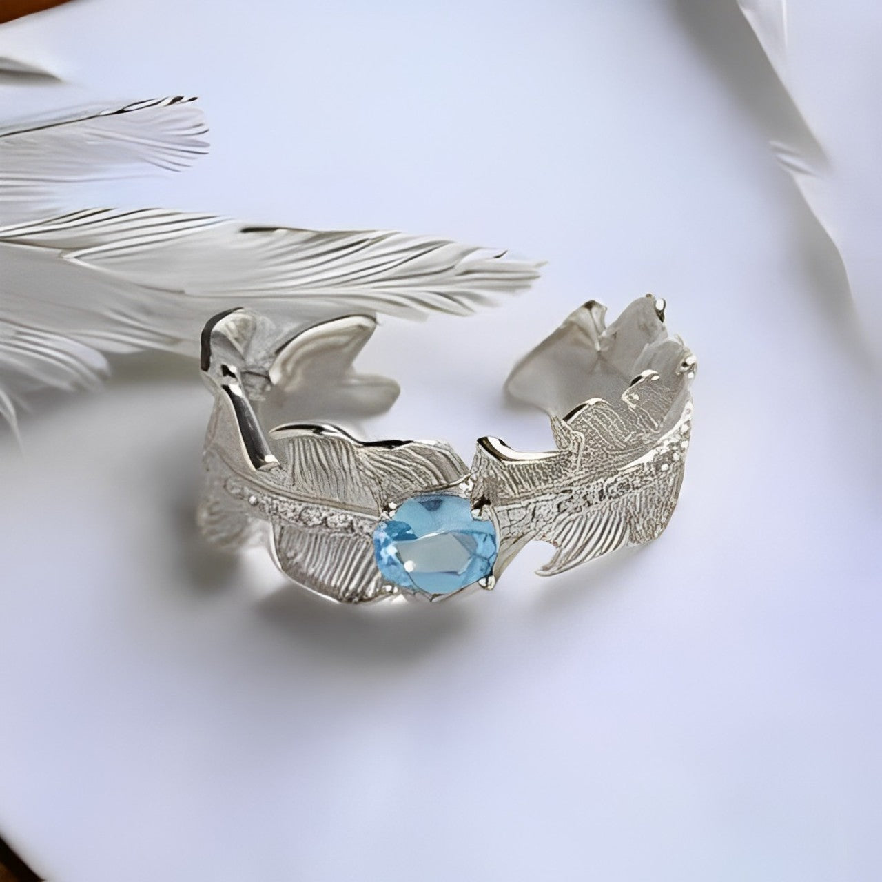 Sky Wings Topaz Ring